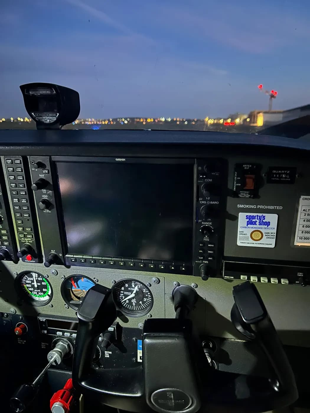 Cockpit at dusk, on the ground