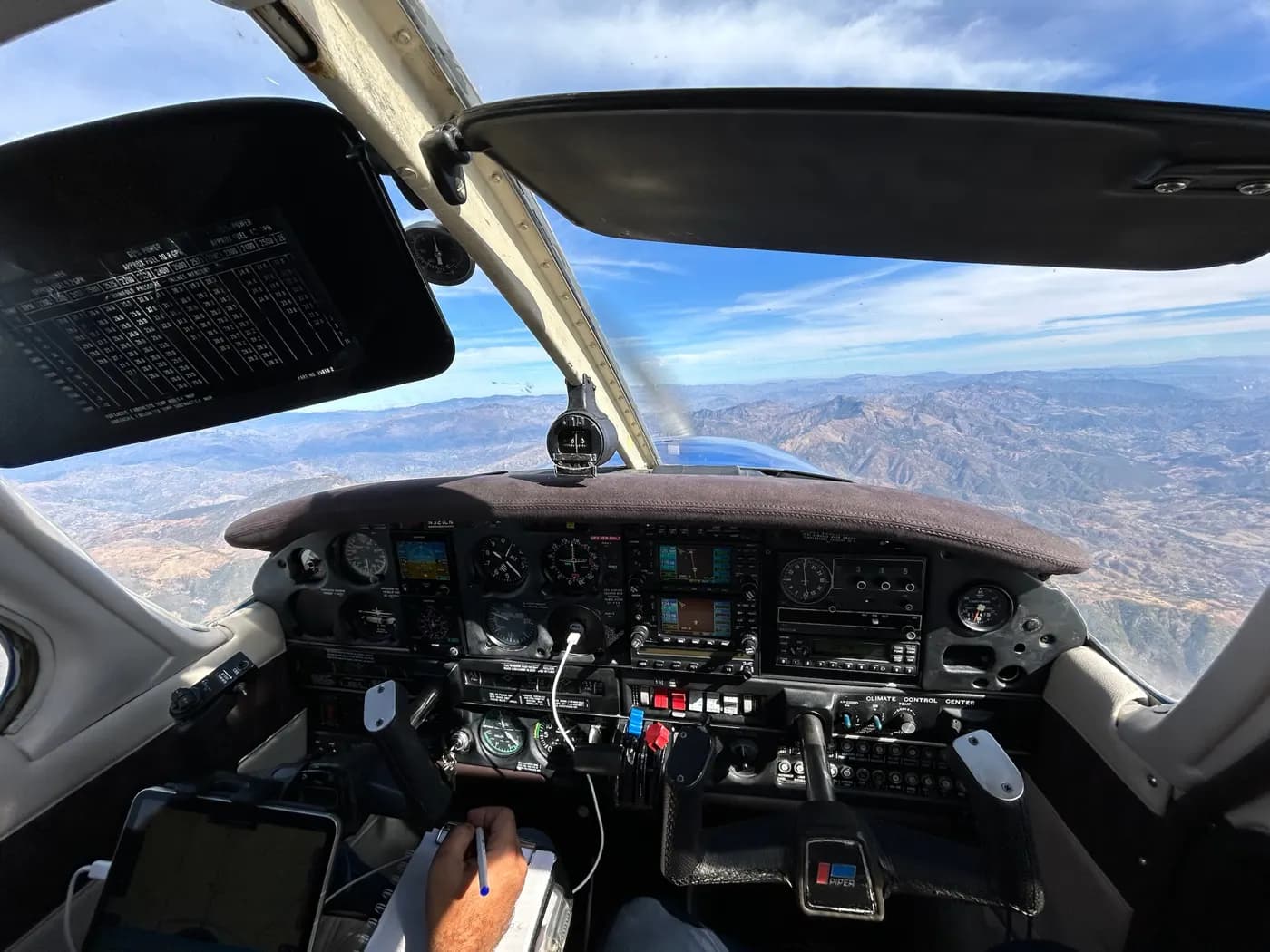 Cockpit view over hills